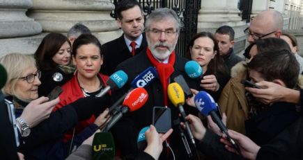 Sinn Fein leader Gerry Adams with party members outside Government Buildings. Photograph: Dara Mac Donaill / The Irish Times