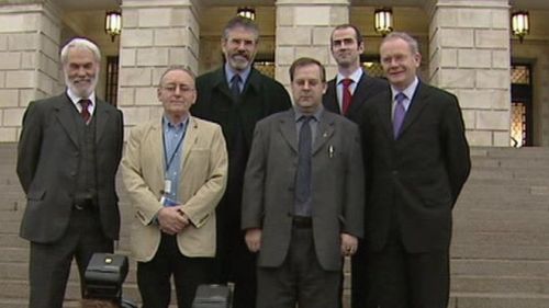 Denis Donaldson (wearing cream jacket) with Gerry Adams, Martin McGuinness and other SInn Fein colleagues at Stormont in happier days